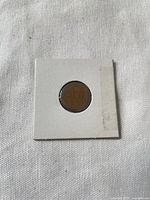 Reverse side of the 1942 Lincoln Wheat cent in cardboard flip