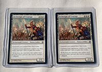 Front view of both Archetype of Courage cards in sleeves