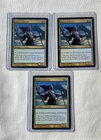 Front view of three Kiora's Follower cards in sleeves