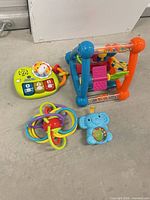 All four infant toys grouped