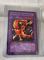 Front of Darkfire Dragon card showing artwork, stats, set number