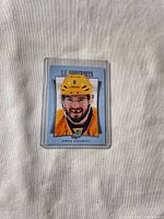 Front of Drew Doughty UD Portraits hockey card in sleeve