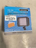 Retail box showing Neewer CN-160 LED Video Lighting branding and specifications