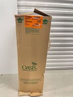 Sealed Oasis shipping carton showing brand and labels