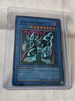 Front of Zera the Mant card inside plastic protector showing artwork, stats and text