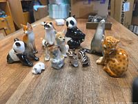 Group shot showing all 13 Lomonosov porcelain animal figurines