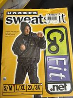 Front of unopened Go Fit hooded sweatsuit retail box showing product image and size range