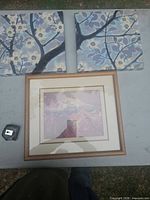 All three wall art pieces on table for overview