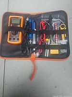 Full view of zip case opened showing all tools