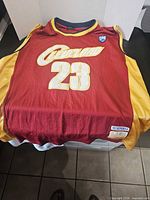 Front view of red Cleveland #23 jersey