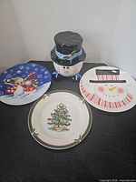 All three plates and cookie jar displayed