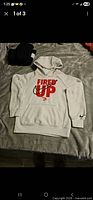 Front view showing Fired Up graphic and pocket
