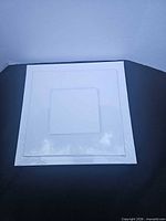 stacked 10x10 and 4x4 canvas panels