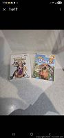 Both Wii games side by side in cases