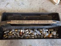 Black tray filled with bayonet base bulbs