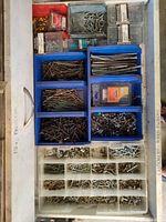 Drawer view showing all organizers filled with assorted fasteners
