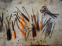 All tools spread on bench showing quantity and variety