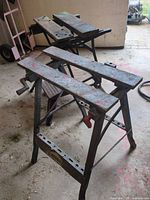 Two JobMate folding workbenches in workshop setting
