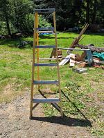 Front view of Keller 6 ft fiberglass step ladder fully opened