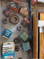 Tray with assorted boxed and loose bearings and seals