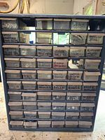 Front view showing full organizer with labelled drawers