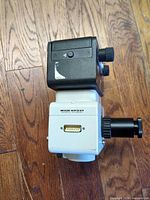 Front view showing Wild MPS51 label and multi-pin connector