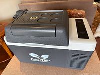Exterior view of F40C4TMP portable refrigerator showing digital panel, vents and branding