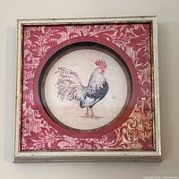 Framed square art print on wall
