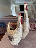 Both rooster planters front view