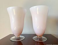 Front view of both pink glass lamps