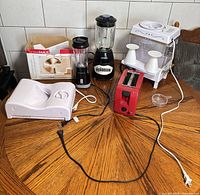Group shot of all five kitchen appliances on table