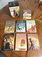 Full set with slipcase and seven books laid out