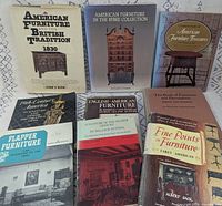 Front view showing all nine book covers