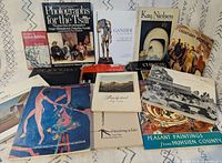All fourteen books front covers displayed