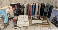 Group shot of all 20 books standing in two rows