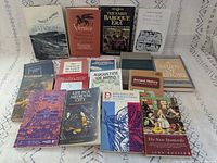 All 17 books laid out front and spine view