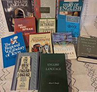 Front covers of ten books displayed upright