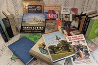 All 27 books arranged to show covers