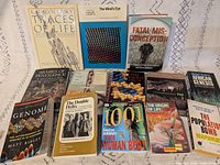 All thirteen science books laid out front covers visible