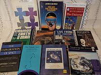 All eleven books laid out cover-up