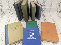 All eight books front view showing covers and colors