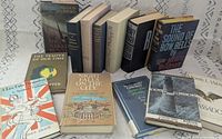 Group shot of all books laid out, showing spines and covers