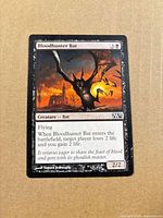 Front of Bloodhunter Bat card showing artwork, mana cost, text and power/toughness