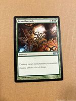 Front of Bramblecrush card showing title, mana cost 2GG, artwork, set symbol M14, and type line Sorcery