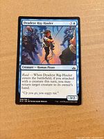 Front of Deadeye Rig-Hauler card showing artwork, mana cost, text, and stats