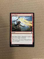 Front of Dual Shot card showing title, artwork, casting cost and text