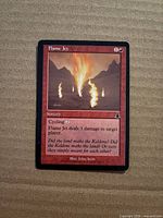 Front of Flame Jet card showing artwork, text, condition wear