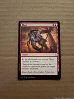 Front of Fling card showing title, mana cost, artwork, rules text