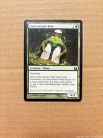 Front of Gatecreeper Vine card showing artwork, text, mana cost and stats