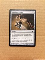Front of Ghoulcaller’s Bell card showing title, mana cost, artwork, text box, set symbol